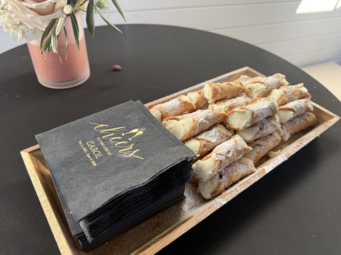 Cannoli on a serving board at an Italian Brothers catered celebration
